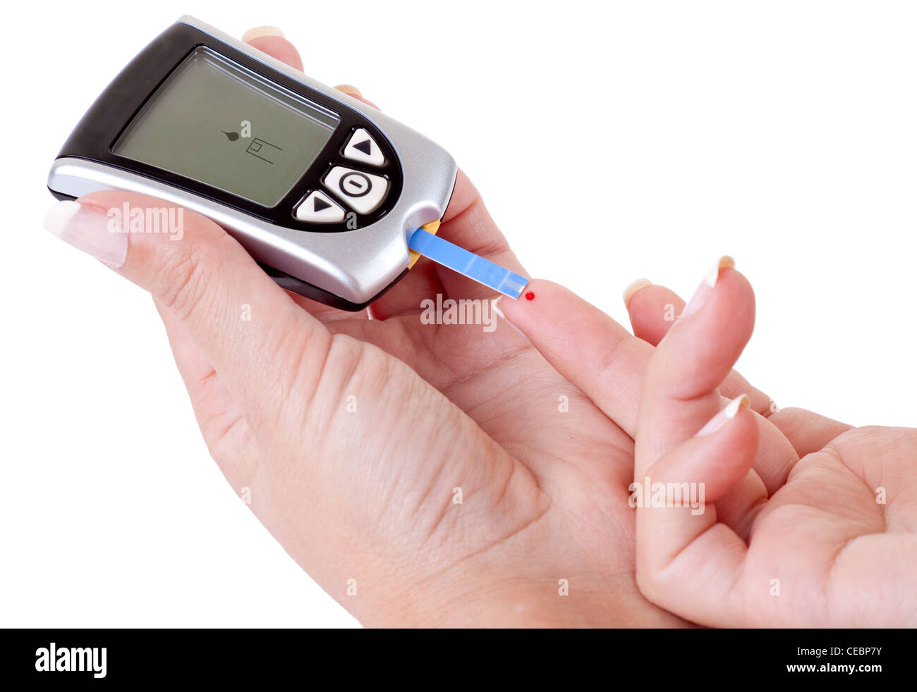 Frau mit Diabetes macht einen Blut-Test mit einem Blutzuckermessgerät Stockfoto