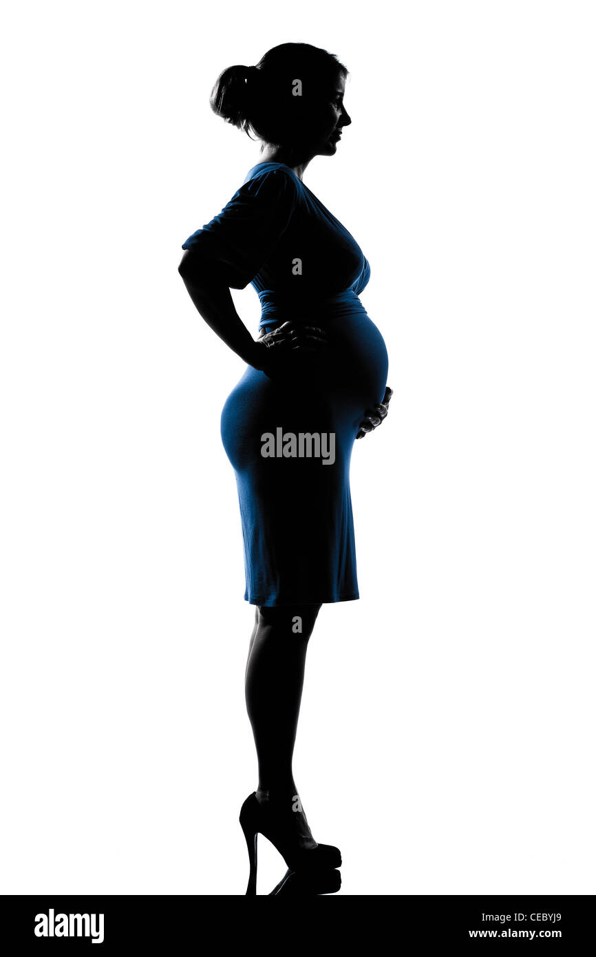 schöne kaukasischen schwangere Frau in voller Länge Silhouette auf weißem Hintergrund Studio isoliert Stockfoto