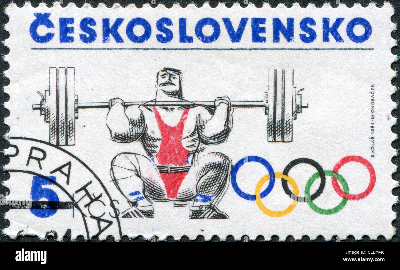 Eine Briefmarke gedruckt in der Tschechoslowakei, widmet sich der Olympischen Sommerspiele in Los Angeles, zeigt eine Gewichtheben, ca. 1984 Stockfoto