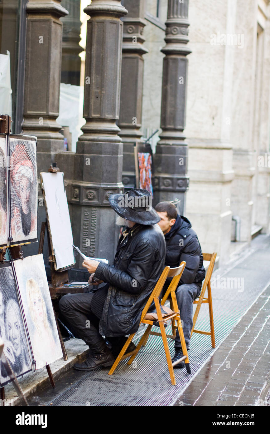 Streetart-Künstler zeichnen ein Porträt und Menschen auf den Straßen von Rom Stockfoto