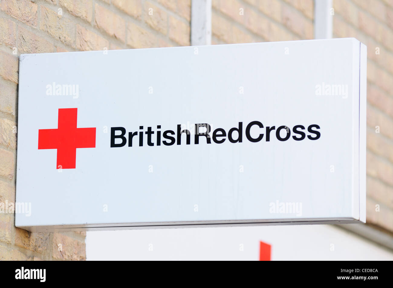 Britische Rote Kreuz Charity Shop Zeichen, Cambridge, England, UK Stockfoto