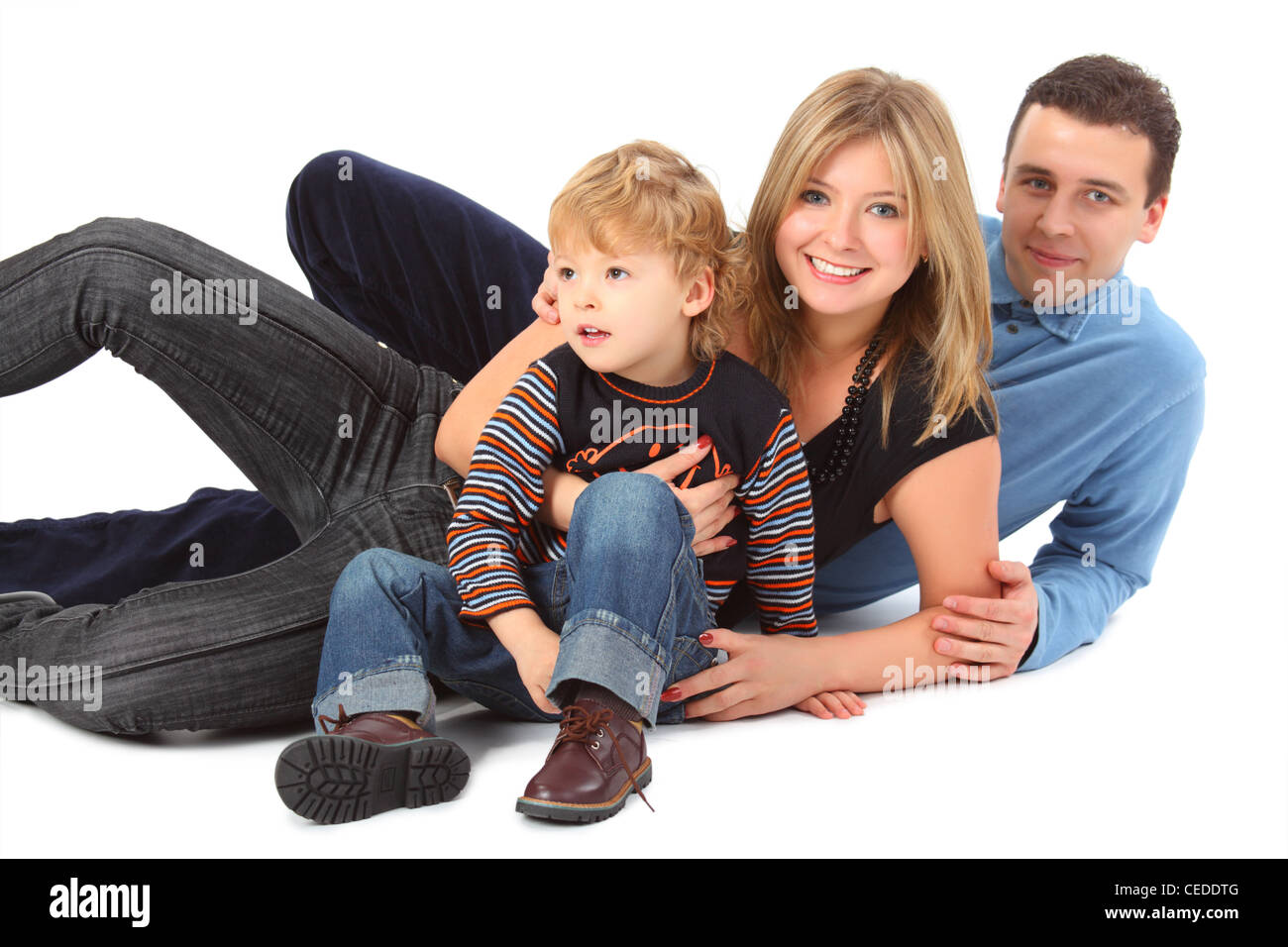 Glückliche Eltern mit Sohn Verlegung Stockfoto