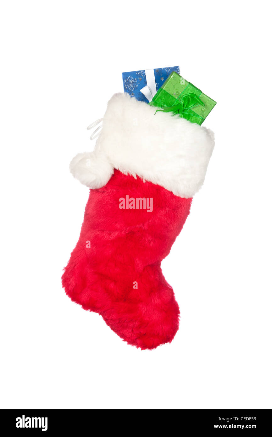Ein Weihnachts-Strumpf mit Strumpf Stuffer präsentiert isoliert auf weiss. Stockfoto