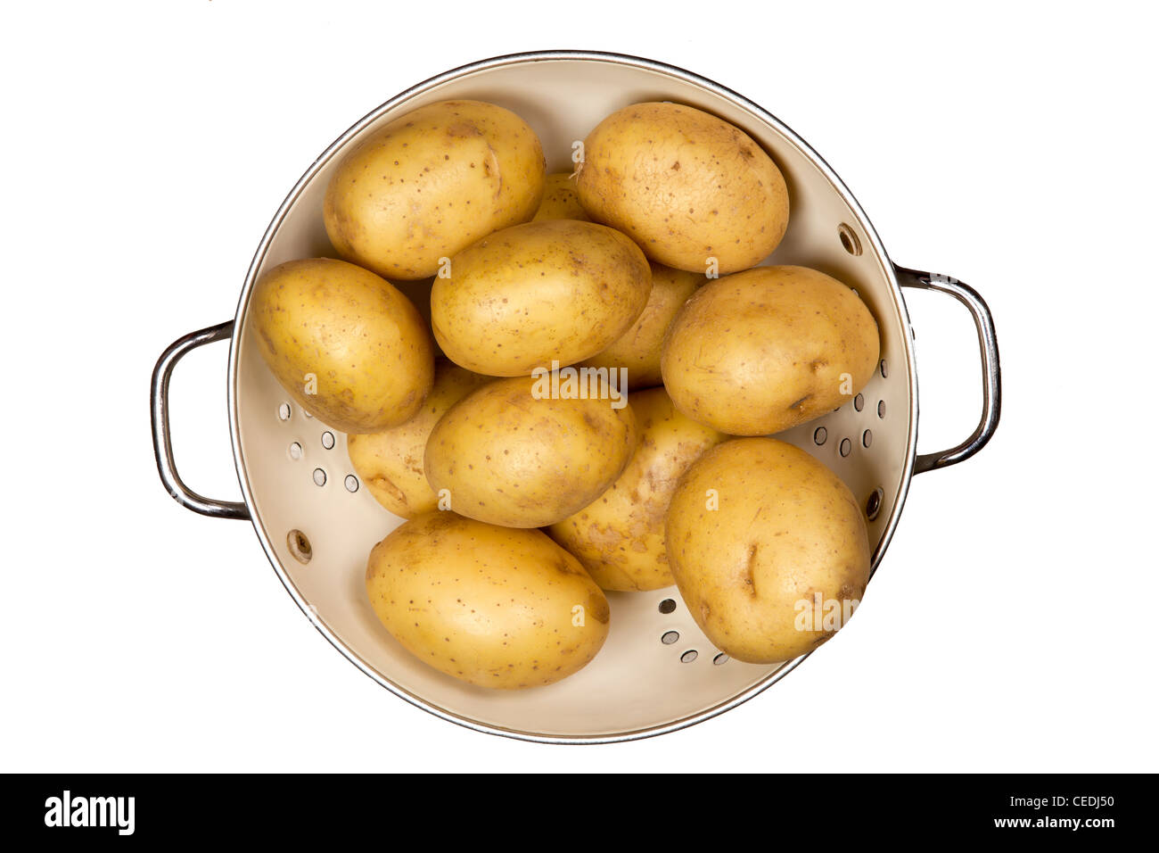 Kartoffeln in Sieb Stockfoto