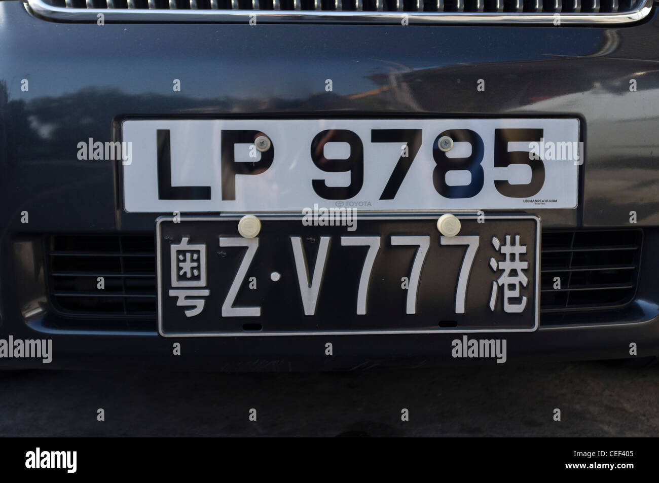 dh TRANSPORT HONG KONG Auto zwei Kennzeichen mit Hong Kong und China Registrierung chinesische Nummern Platten Autos Stockfoto