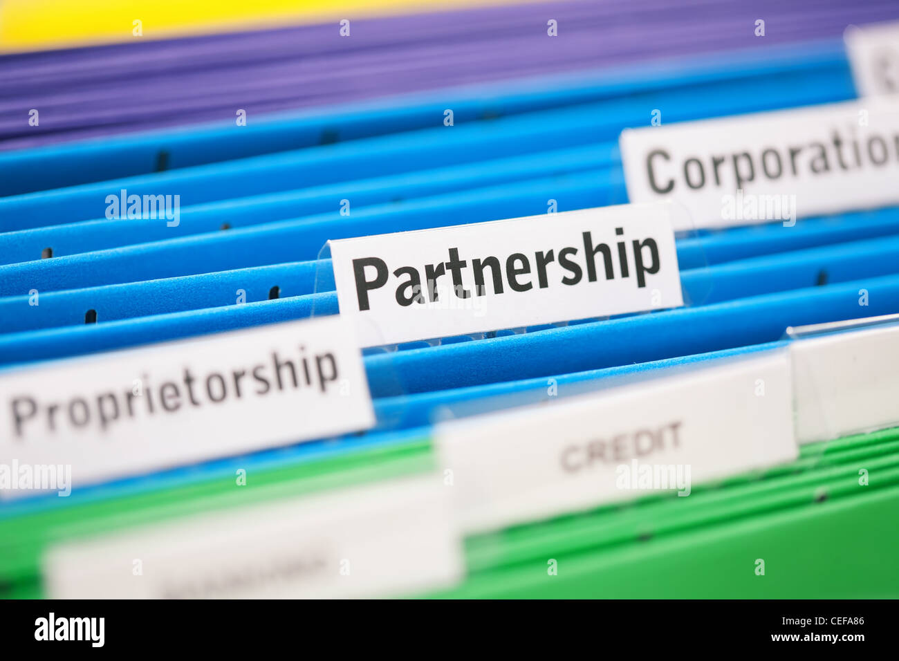 Partnerschaft-Geschäftseinheit in einem blauen Ordner abgelegt Stockfoto
