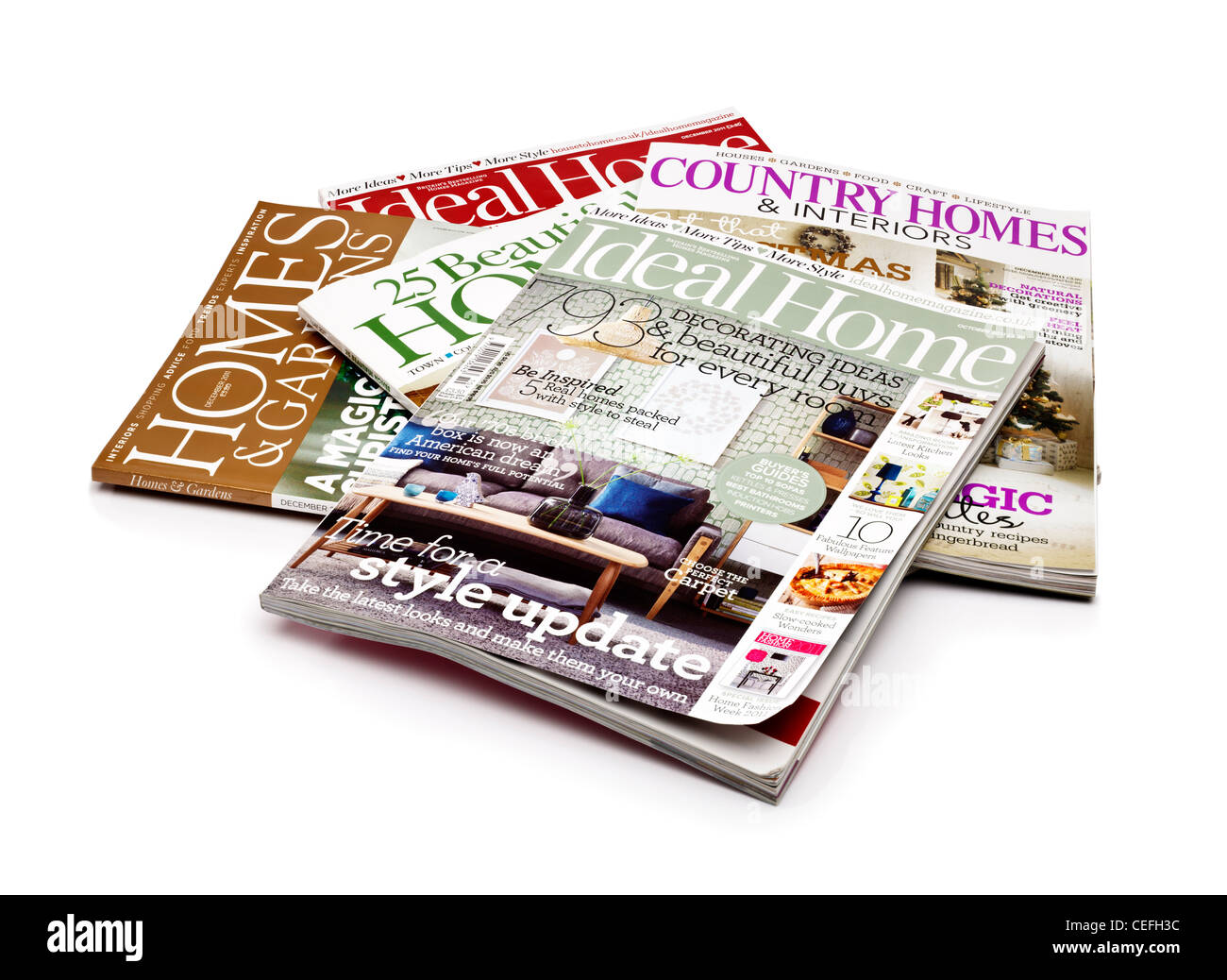 Haus-Zeitschriften auf weißem Hintergrund Stockfoto