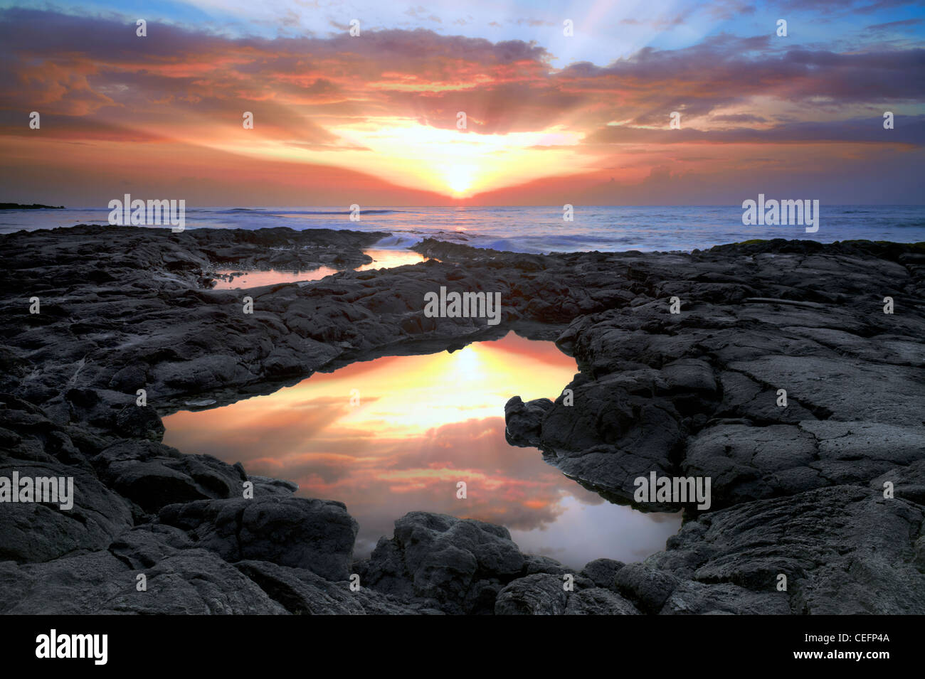 Sunrise und Tidepool. Hawaii, Big Island. Stockfoto