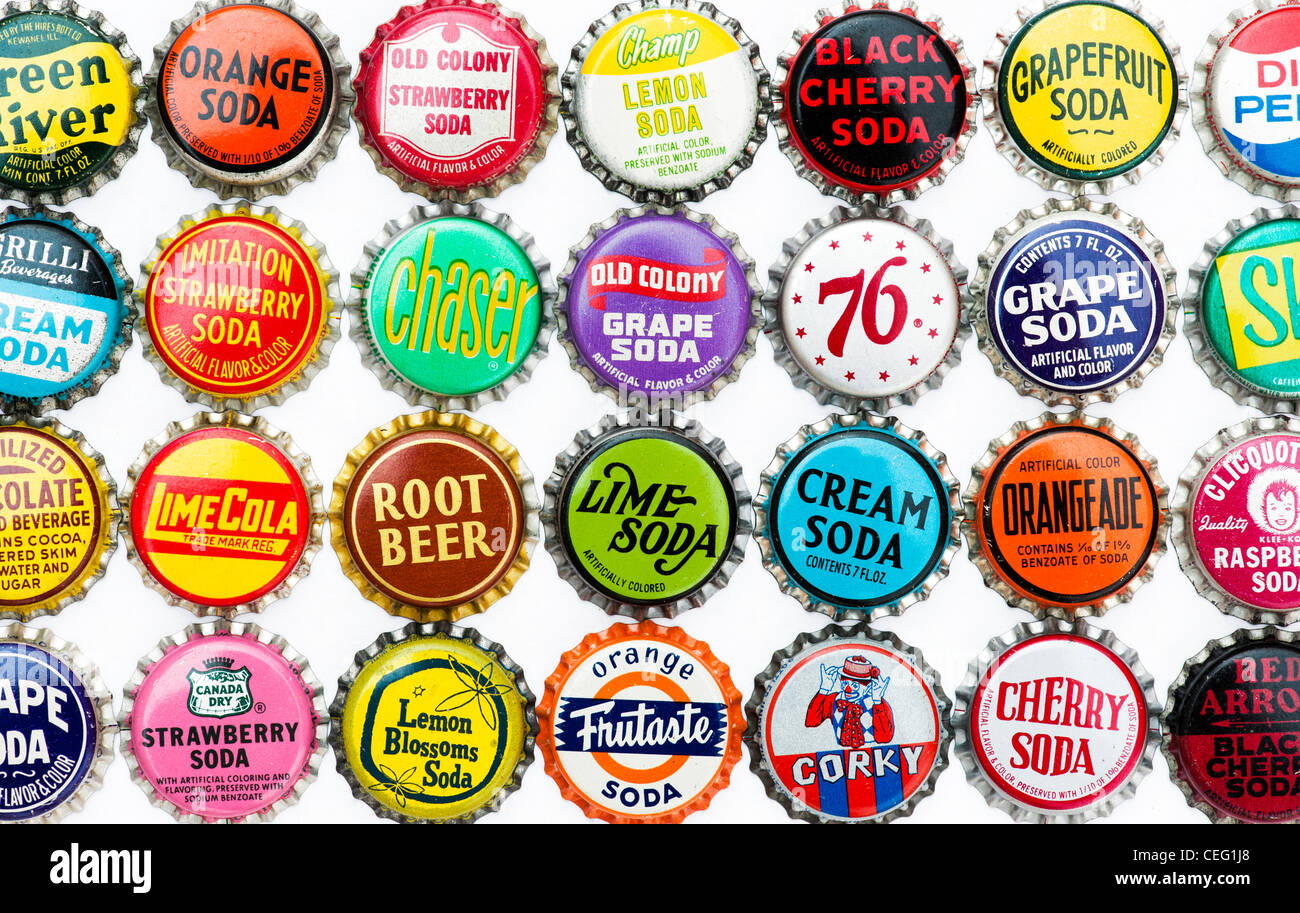 Retro-amerikanische Soda Kronkorken auf weißem Hintergrund Stockfoto