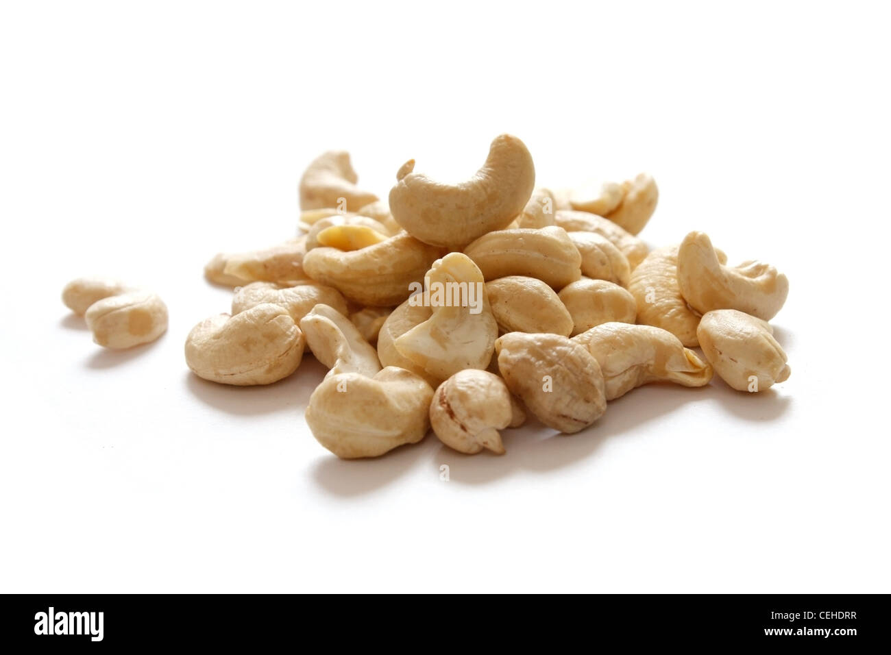 Cashew-Nüssen isoliert auf weißem Hintergrund Stockfoto