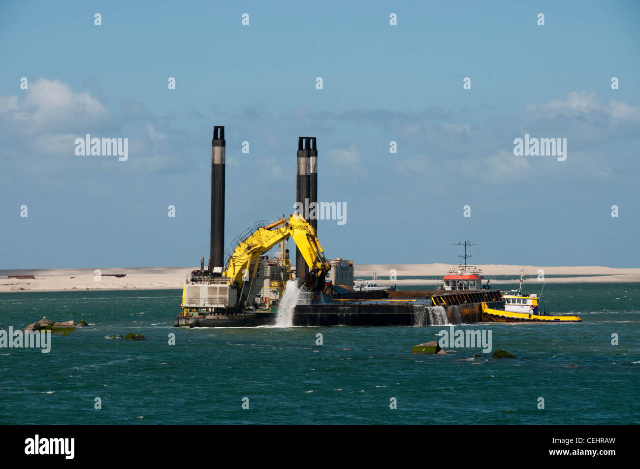 Bagger für den Gewinn neuer Grundstücke in der Nähe der holländischen Küste für die Schwerindustrie Stockfoto