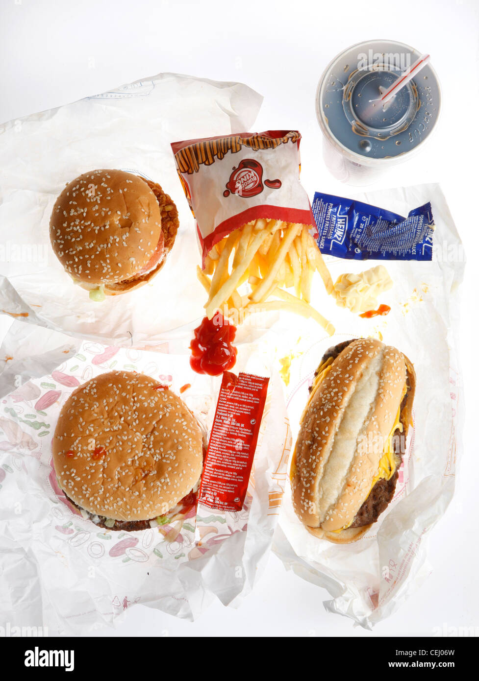 Fast-Food, Ernährung. Verschiedenen Hamburger, Cheeseburger, Pommes frites, Softgetränk. Burger King Produkte. Stockfoto