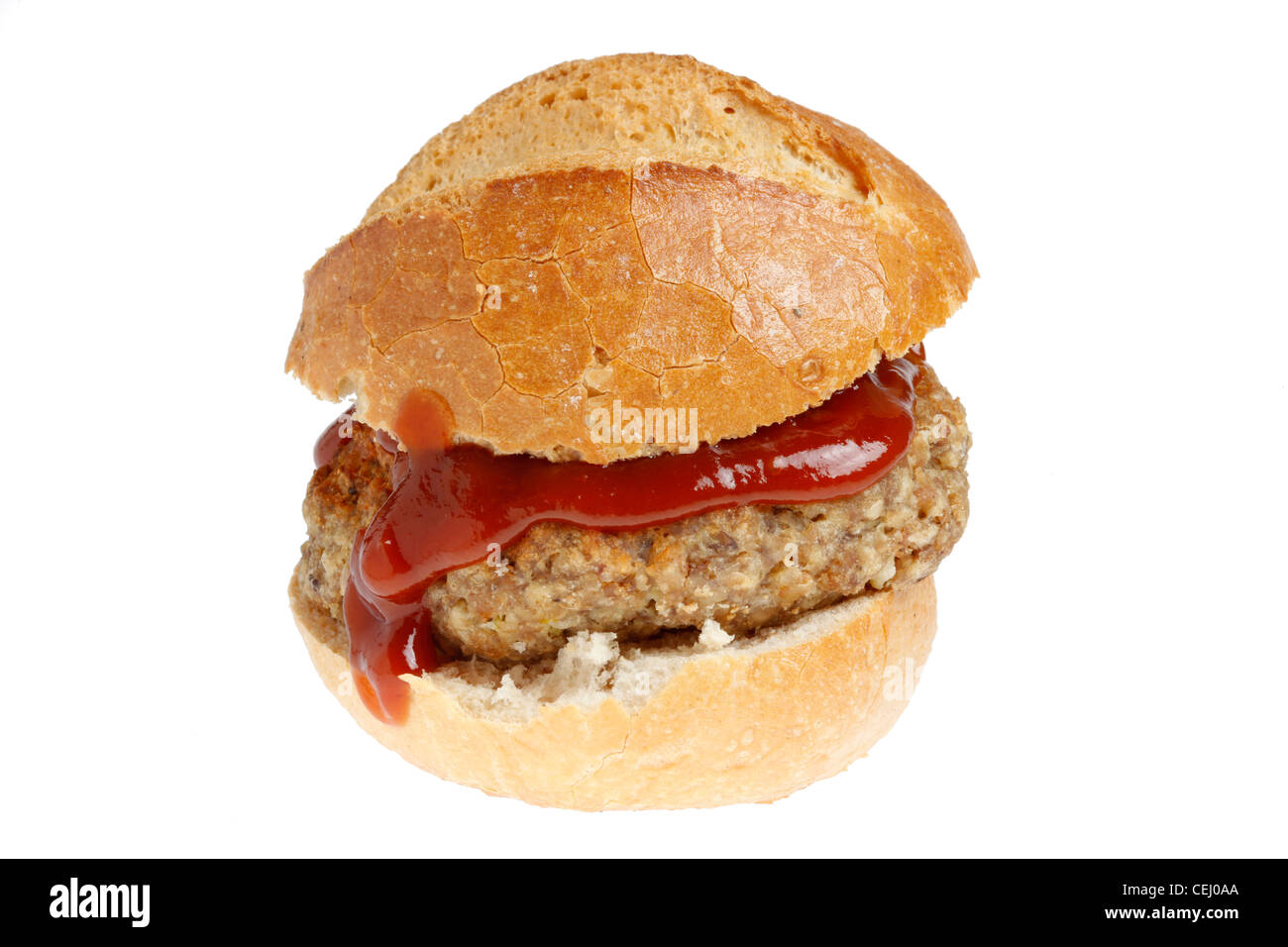 Ernährung, Fast-Food. Brötchen mit einem Rindfleisch Fleisch Ball und Tomaten Ketchup. Stockfoto