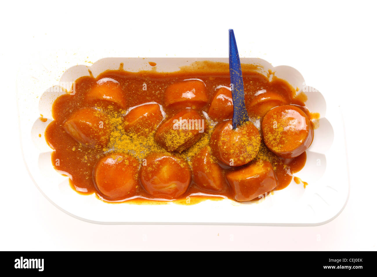 Ernährung, Fast-Food. Curry-Wurst, eine Bratwurst-Stil-Wurst mit pikantem Curry und Tomatensauce. Stockfoto