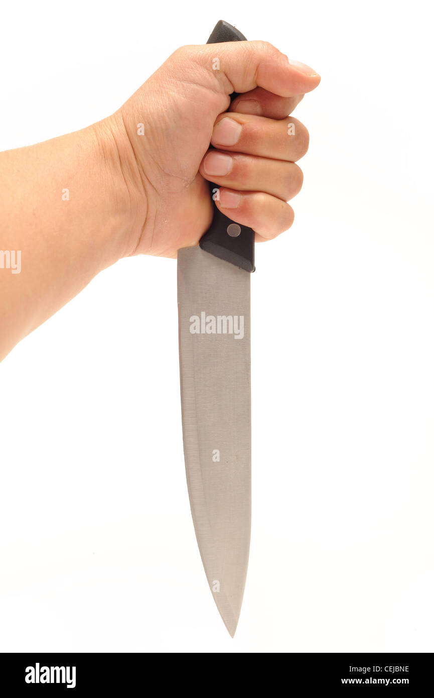 Foto von einem Küchenmesser durch eine menschliche Hand gehalten Stockfoto