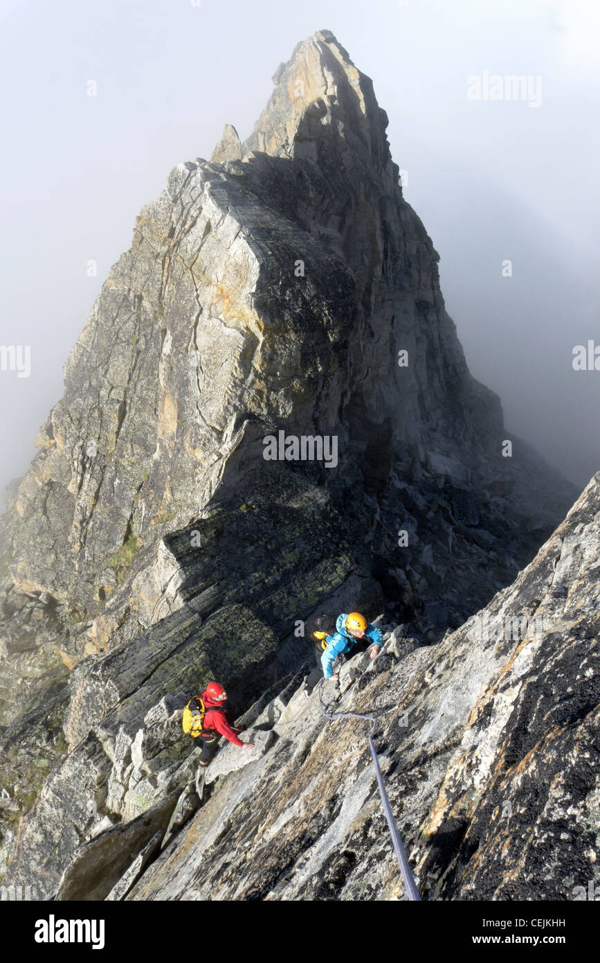 Alpine Kletterer auf dem Dri Horlini Schweiz Stockfoto