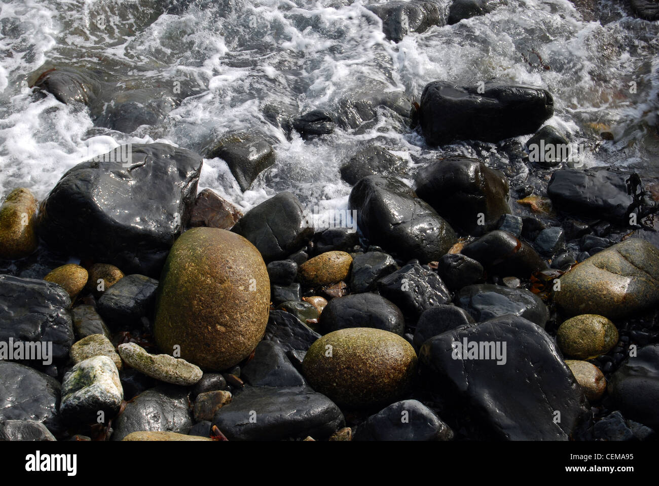 Kieselsteine und Wave Hausnummer Newlyn 3023 Stockfoto