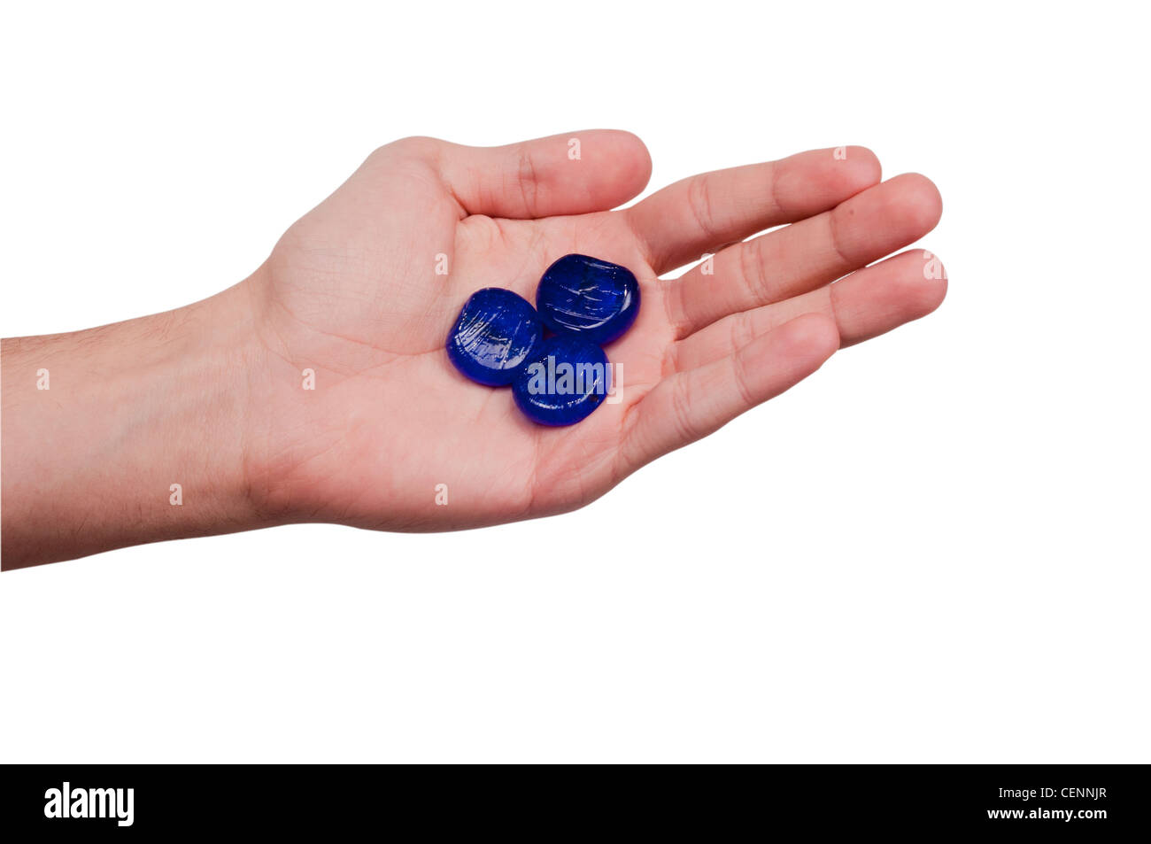 Blaue Spielmarken In Der Hand Halten Stockfoto