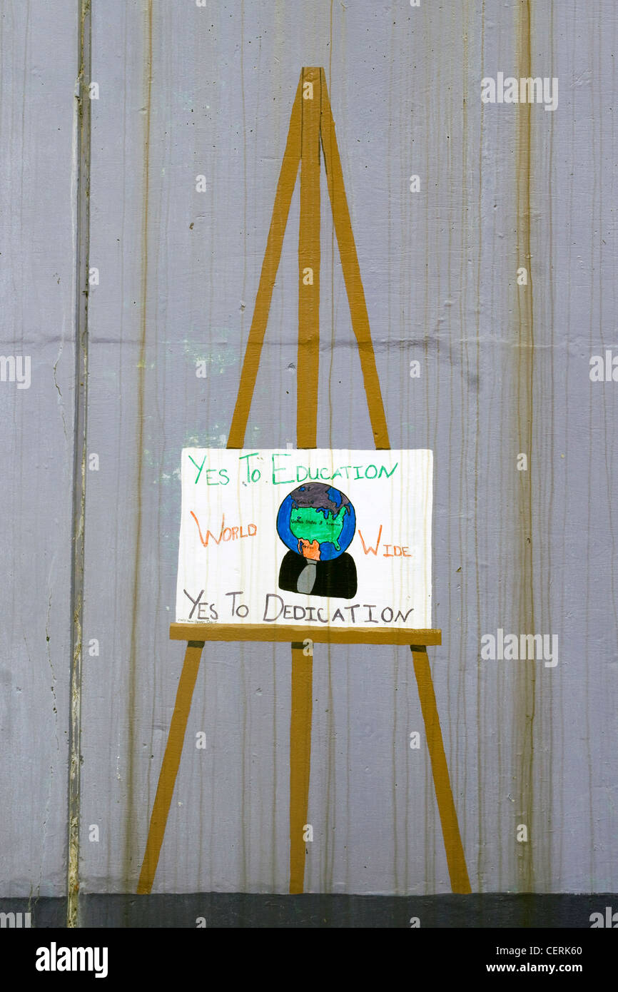 Ein Wandbild Darstellung einer Person mit der Erde als einen Kopf mit Slogan "Ja zur Bildung... Widmung "in Oxon Lauf Gemeinschaft Washington DC Stockfoto