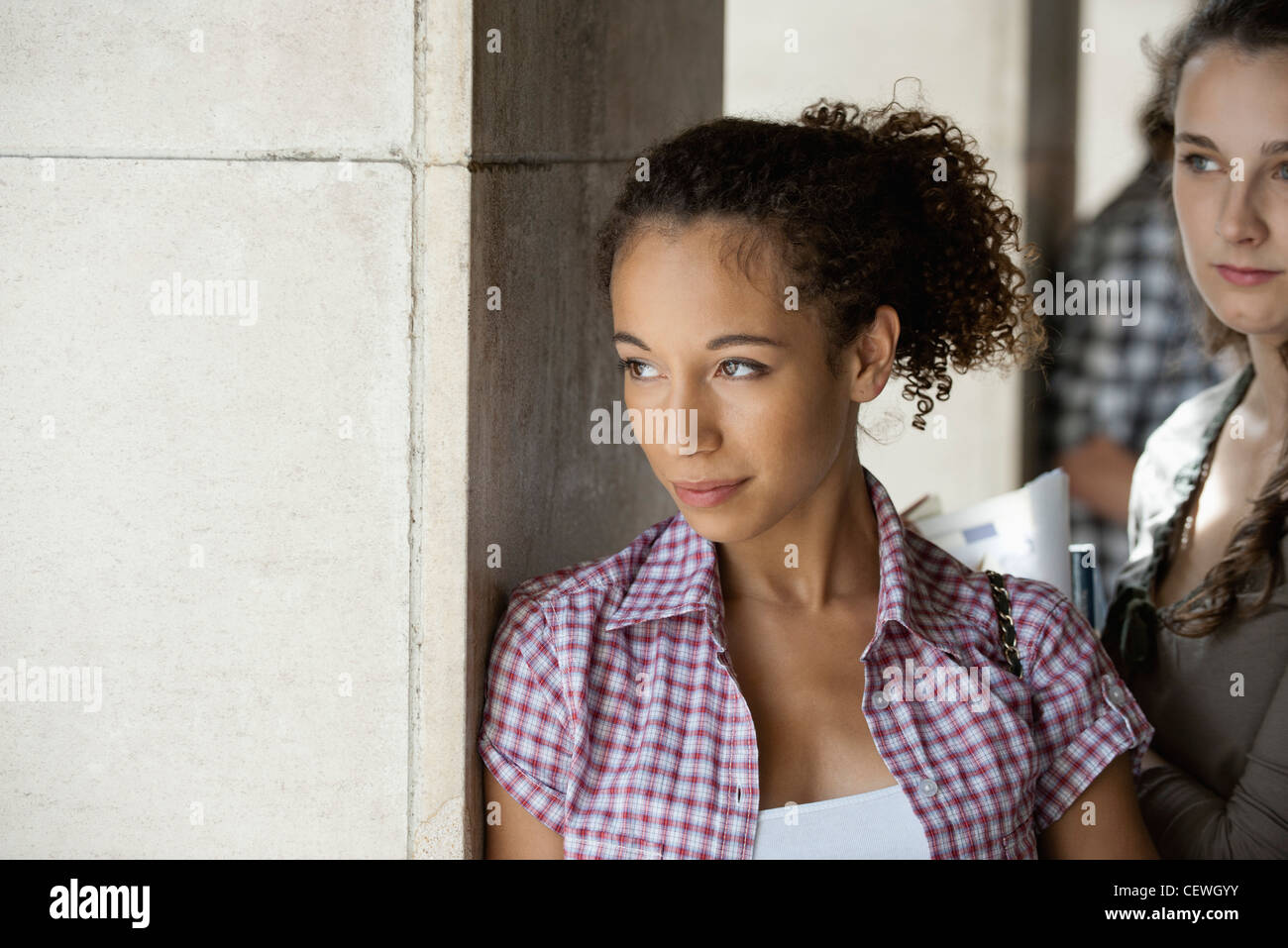 Junge Frau in Gedanken Stockfoto