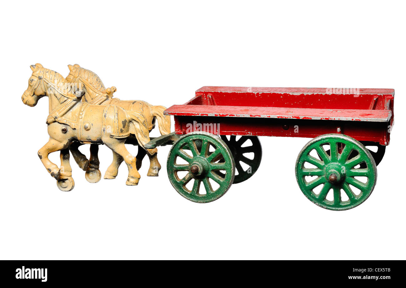 Vintage Spielzeug Pferd und Wagen aus Metall gefertigt. Stockfoto