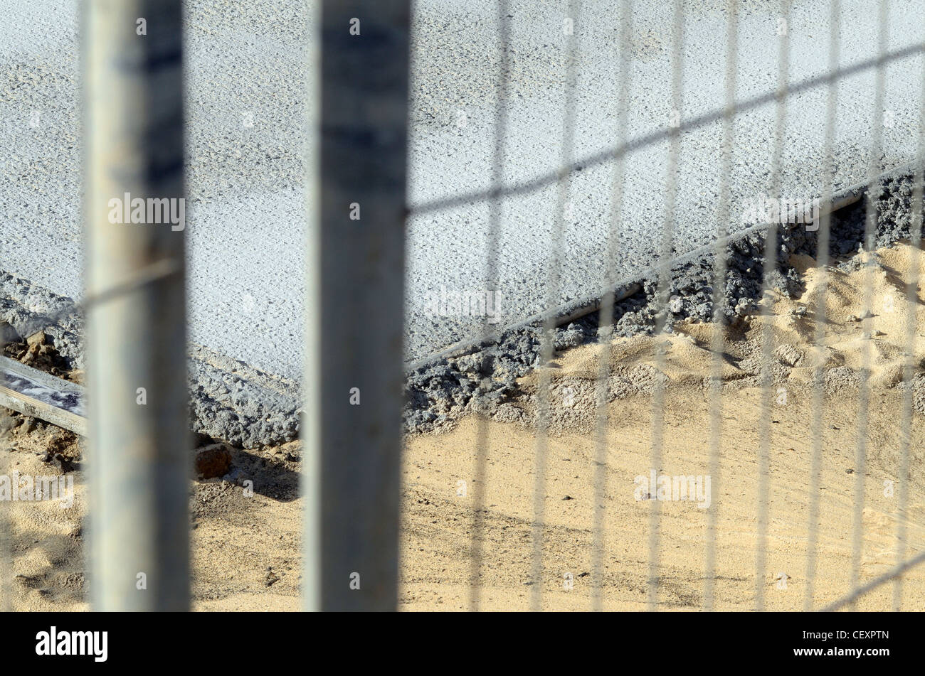 Neu verlegten Beton hinter Schutzzaun Stockfoto