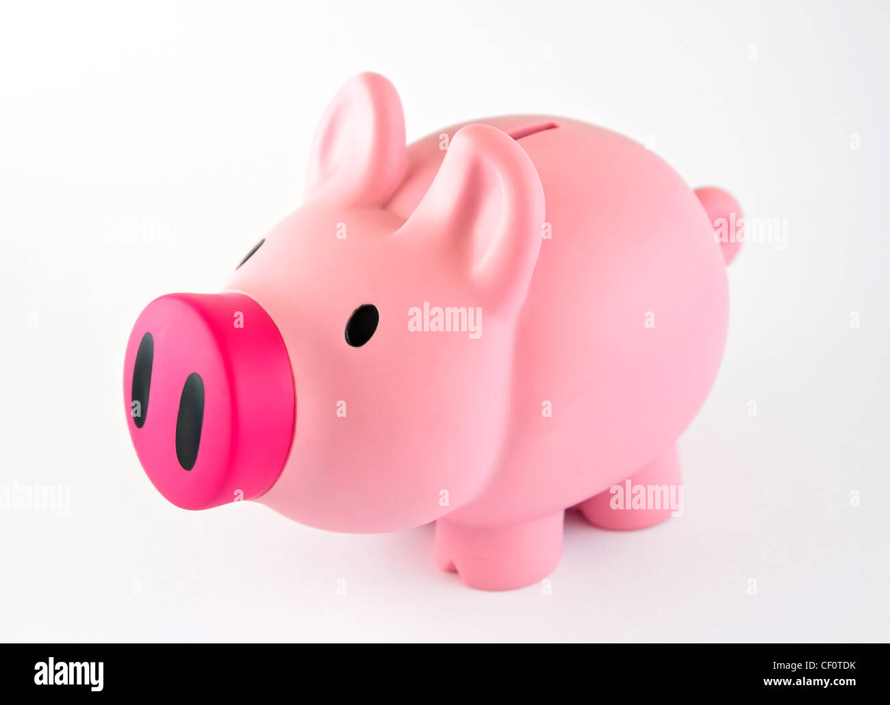 Sparschwein mit rosa Nase, isoliert auf weiß. Stockfoto