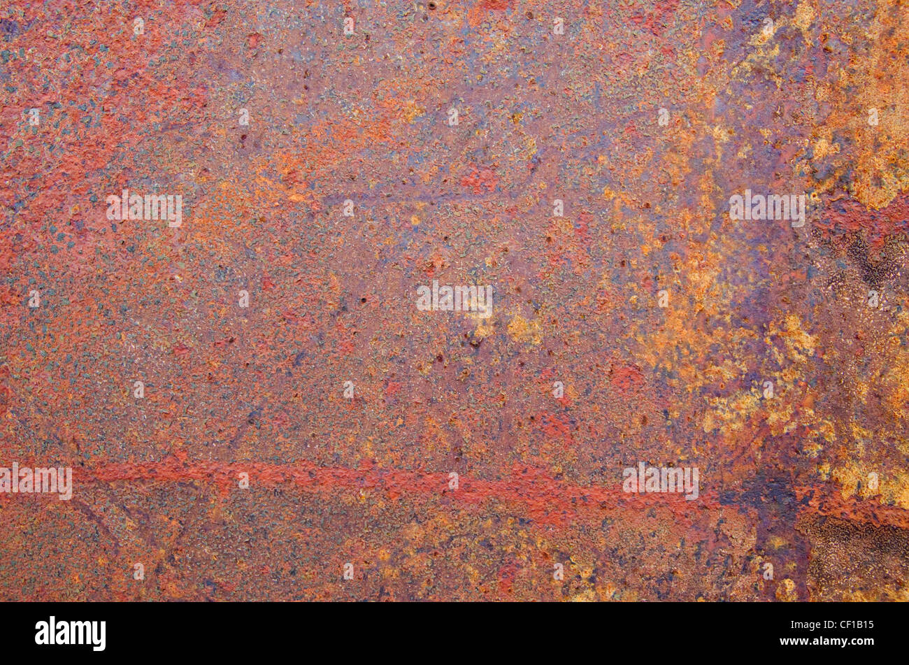 rot und orange rostigen korrodierte Metall Hintergrundtextur Stockfoto