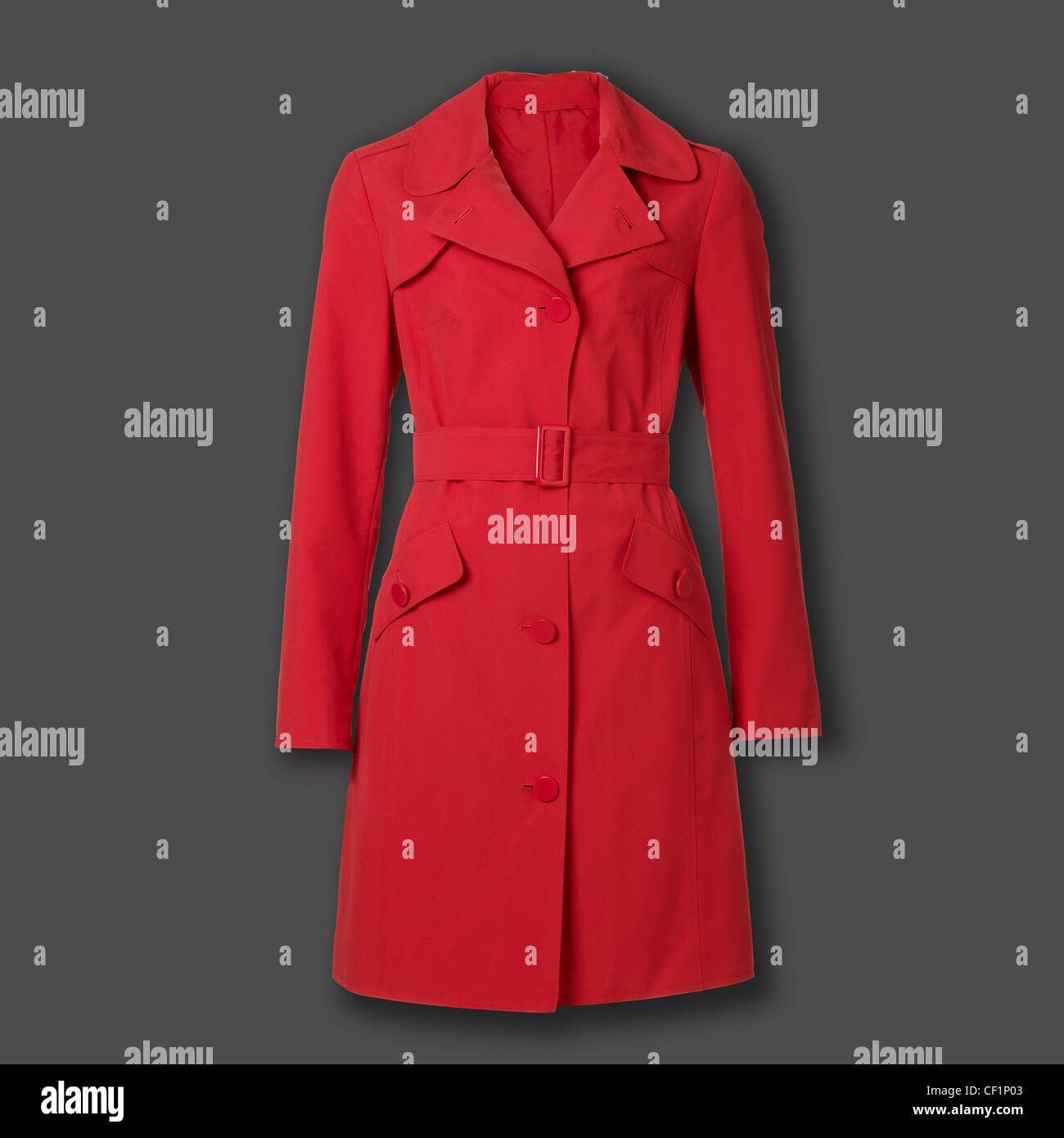 Ein Stillleben Schuss Von Einem Roten Damen Mantel Isoliert Auf Einem Grauen Hintergrund Stockfotografie Alamy