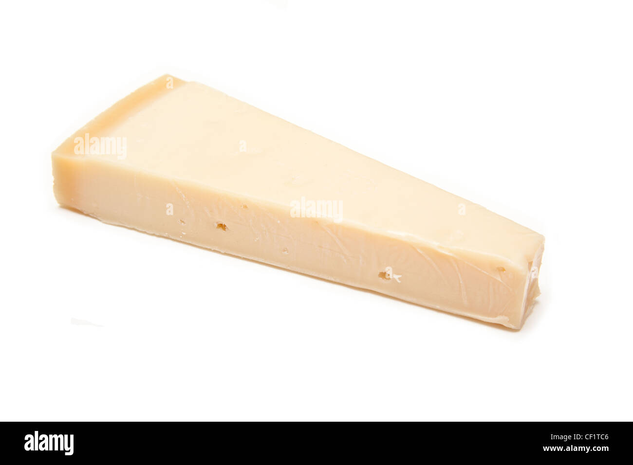 ITALIENISCHEN GRANA PADANO KÄSE AUF EIN WEIßES STUDIO-HINTERGRUND. Stockfoto