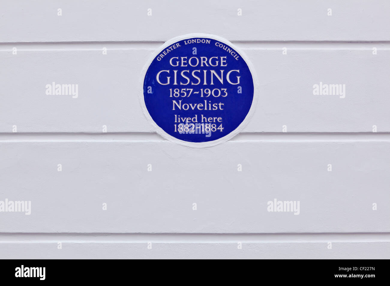 Eine größere London Council (GLC) Tafel an der Wand 33 Oakley Gärten feiern, dass Schriftsteller George Gissing lebte in der hou Stockfoto