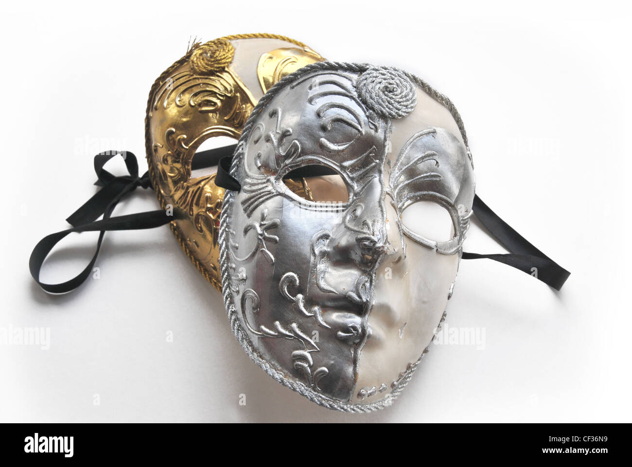 Zwei Theater Silber und Gold gefärbt Gesicht Masken. Stockfoto