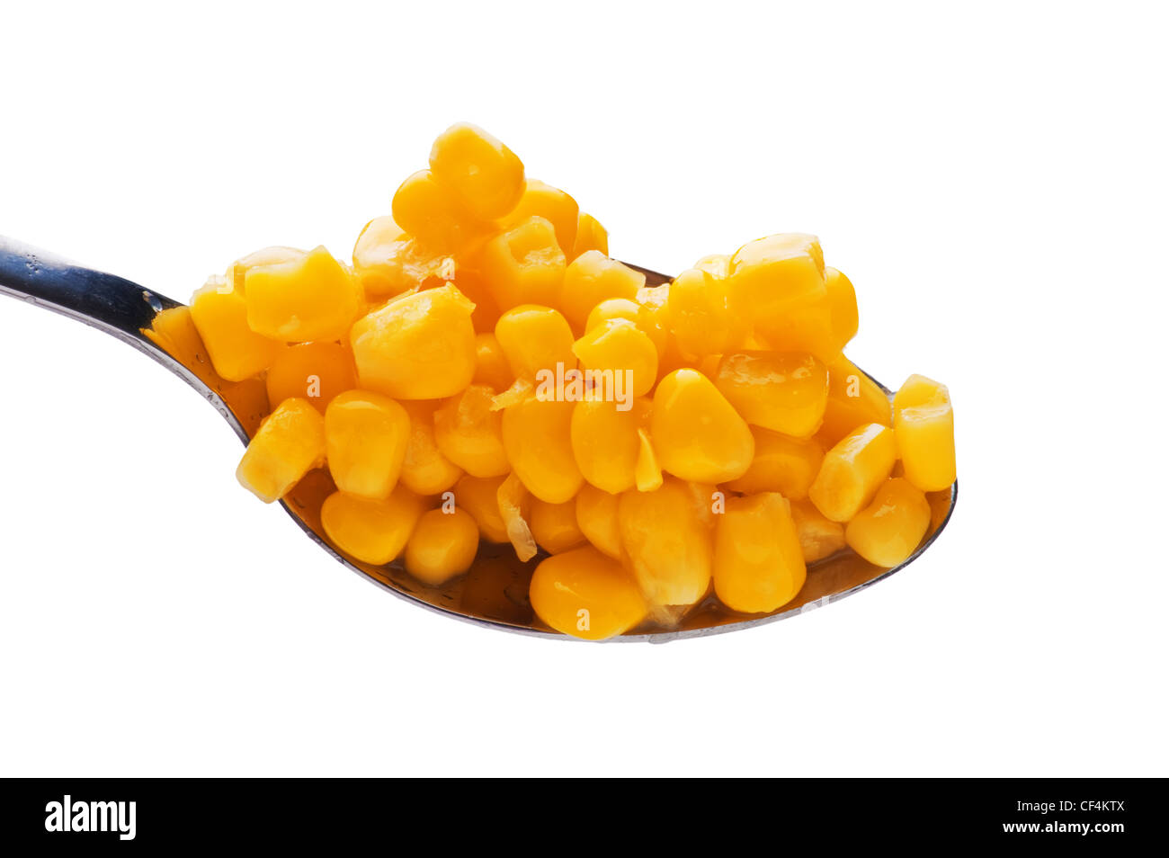 Objekt auf weiß - Essen Mais im Löffel Stockfoto