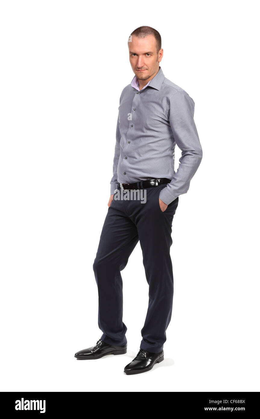 Erfolgreicher Geschäftsmann im Hemd, in voller Länge Portrait isoliert auf weiss Stockfoto