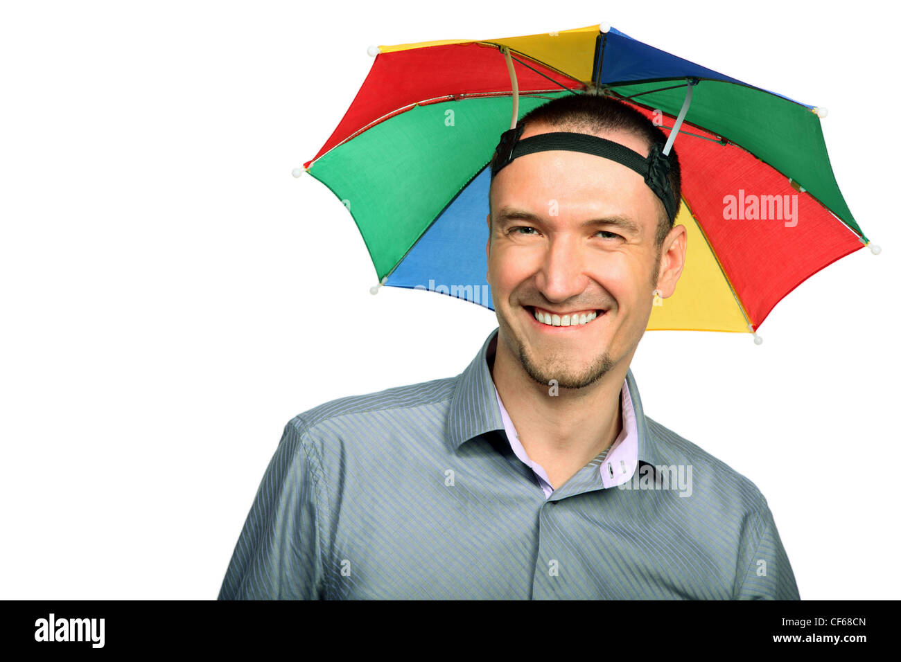 Porträt von glücklich Kaufmann mit Regenbogen Hut Sonnenschirm am Kopf  Stockfotografie - Alamy