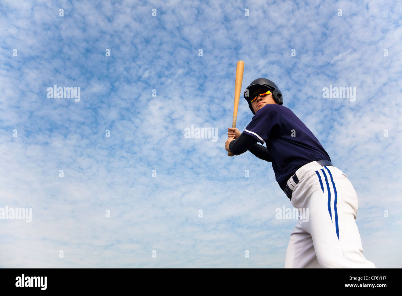 junge Baseballspieler bereit für swing Stockfoto