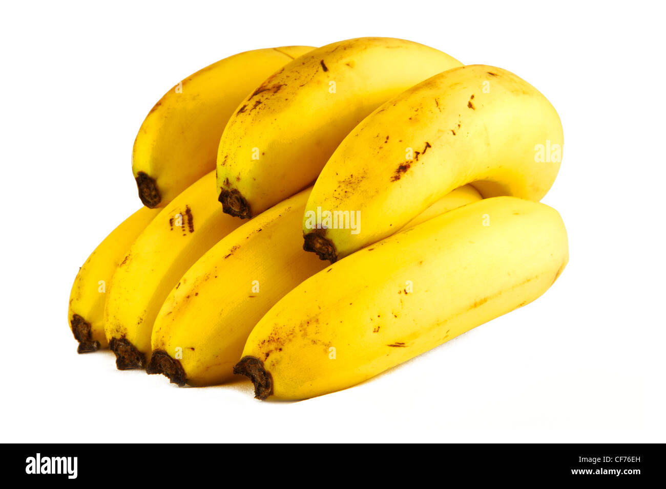 Eine Reihe von sieben Reife gelbe Bananen Stockfoto