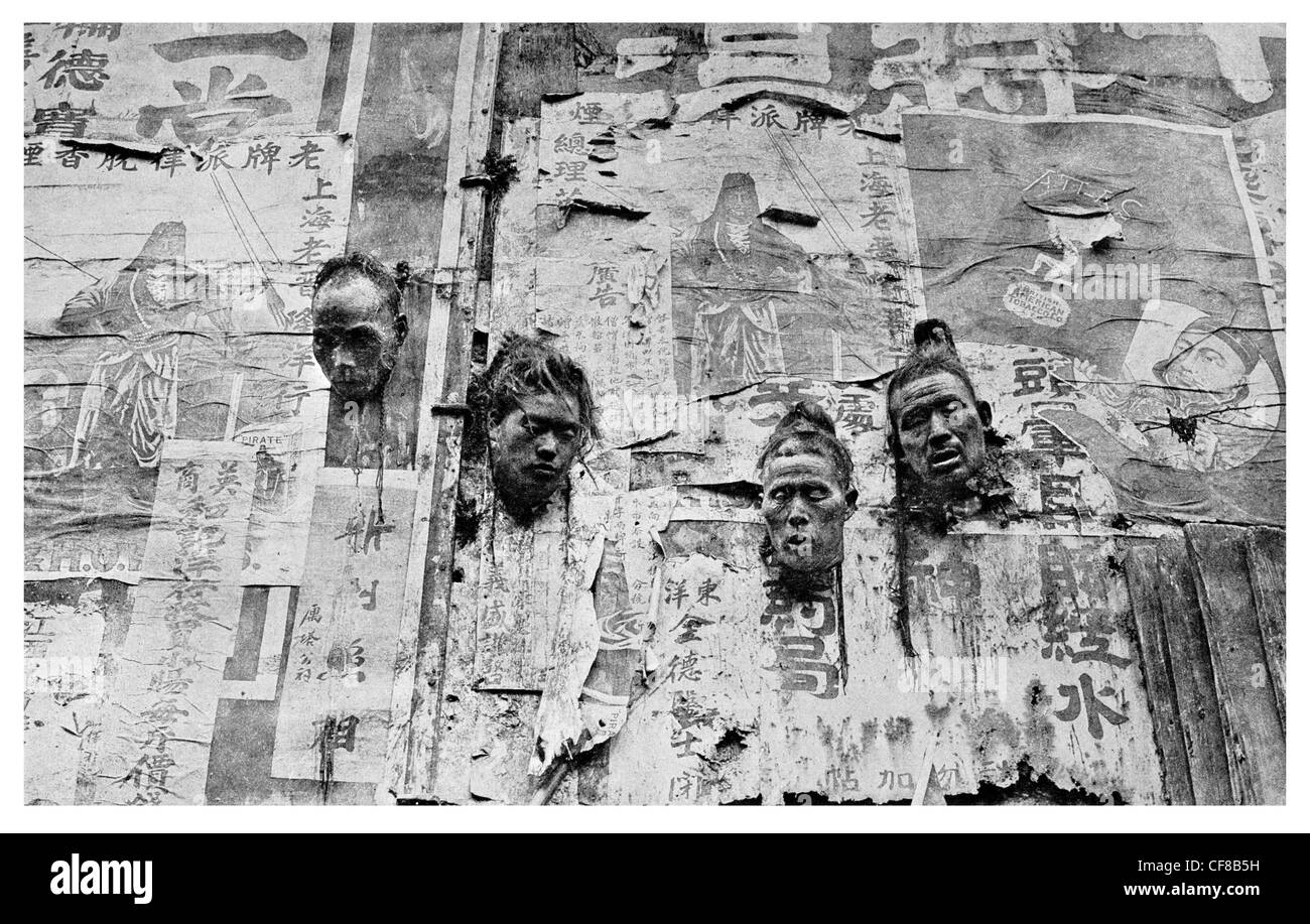 Köpfe der Geächteten auf Plakatwänden in Nanking ausgeführt 1927 veröffentlicht Stockfoto
