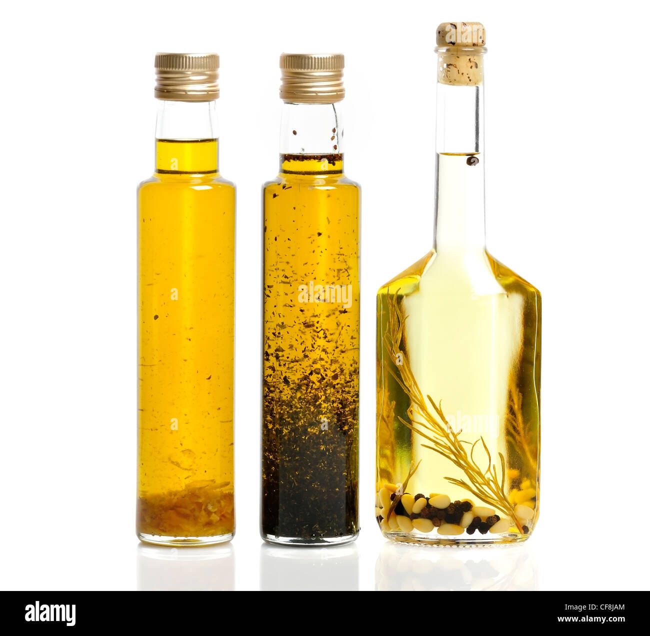 Kochen Ölflaschen auf weißem Hintergrund Stockfoto