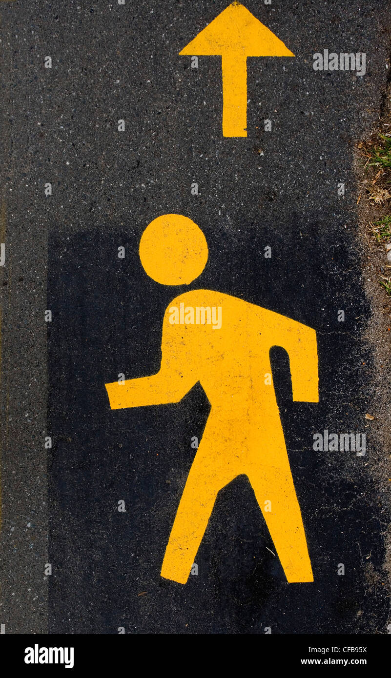 Malerei von einem Fuß Mann auf der Straße Stockfoto