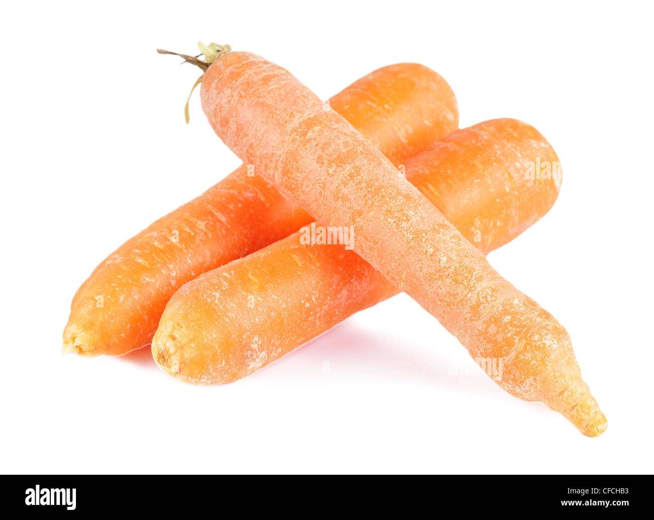 Drei Karotten auf weißem Hintergrund Stockfoto