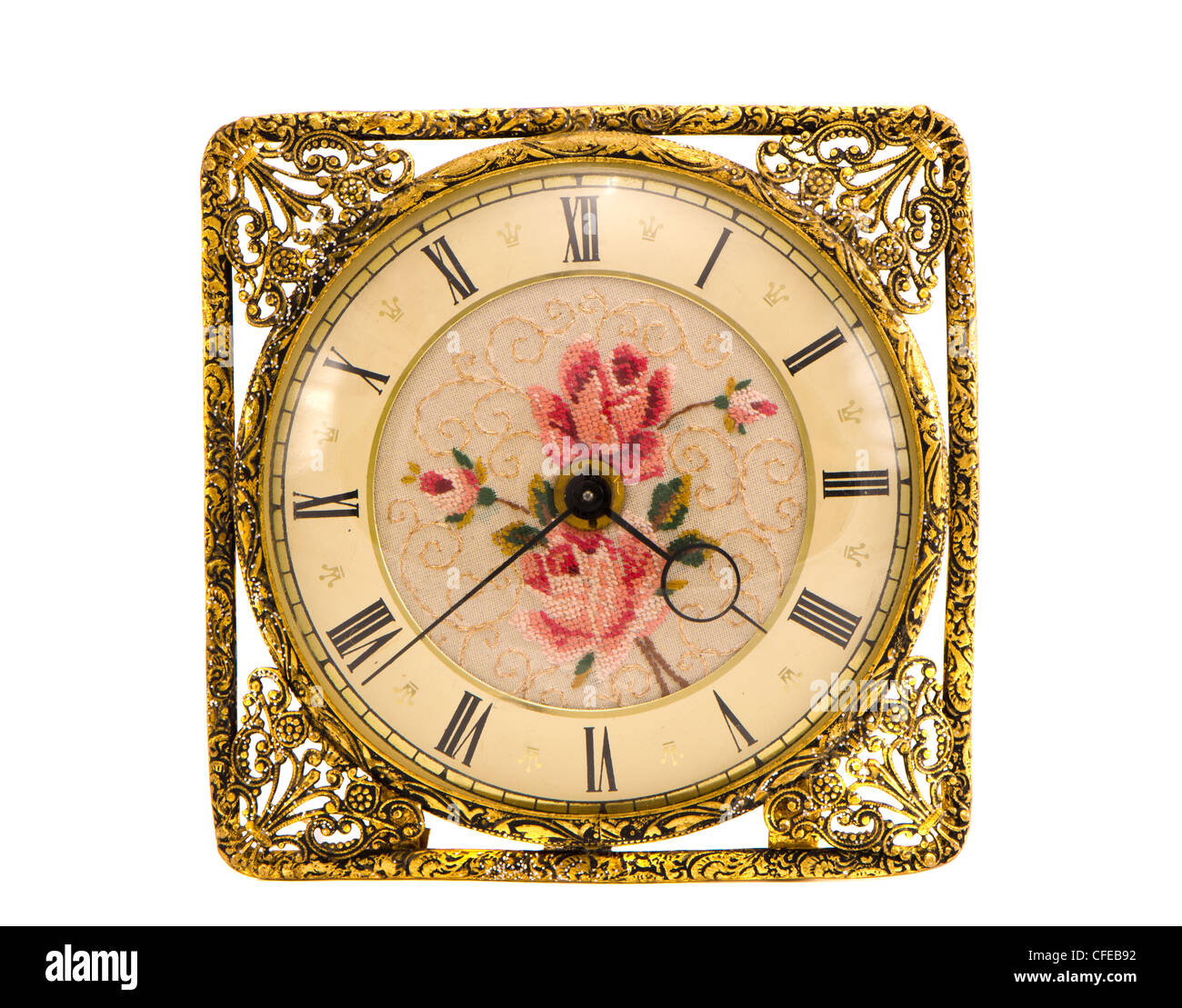 isoliert auf weißem Vintage und reich verzierte Uhr Stockfoto