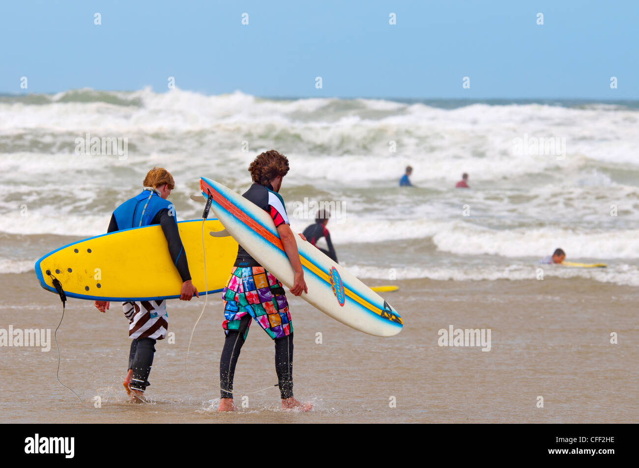 Surfer, Polzeath Strand, Cornwall, England, Vereinigtes Königreich, Europa Stockfoto