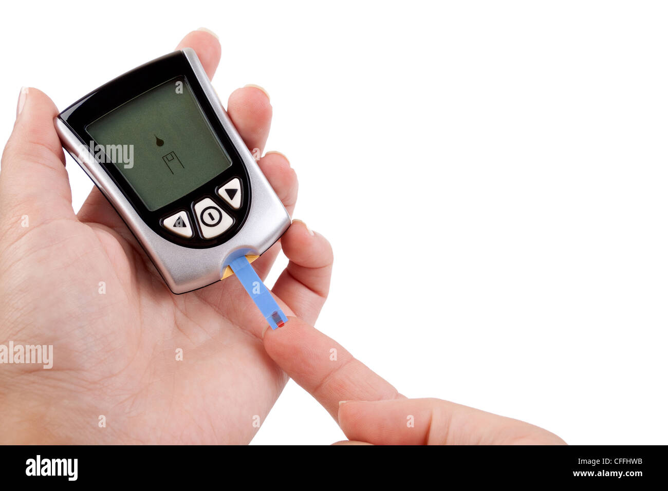 Eine Person mit Diabetes macht einen Blut-Test mit einem Blutzuckermessgerät Stockfoto