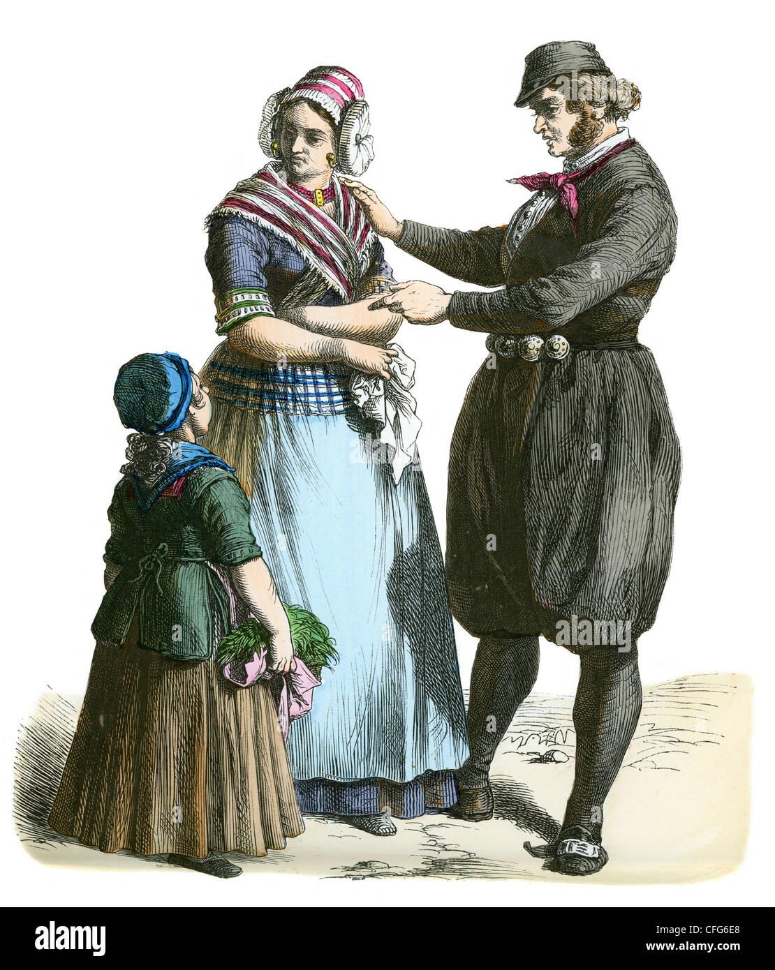 Ein paar mit einem kleinen Kind in der Tracht des niederländischen Country Folk des 19. Jahrhunderts Stockfoto
