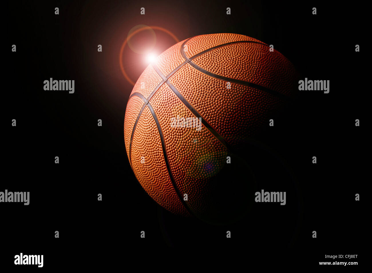 Basketball-Planeten in einem dunklen Hintergrund Stockfoto