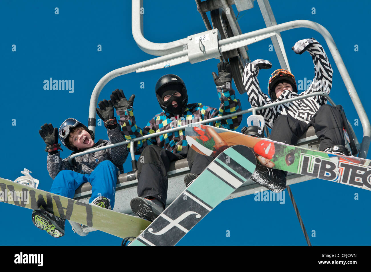 Snowboarder am Skilift, Canada Olympic Park, COP, Calgary, Alberta, Kanada Stockfoto