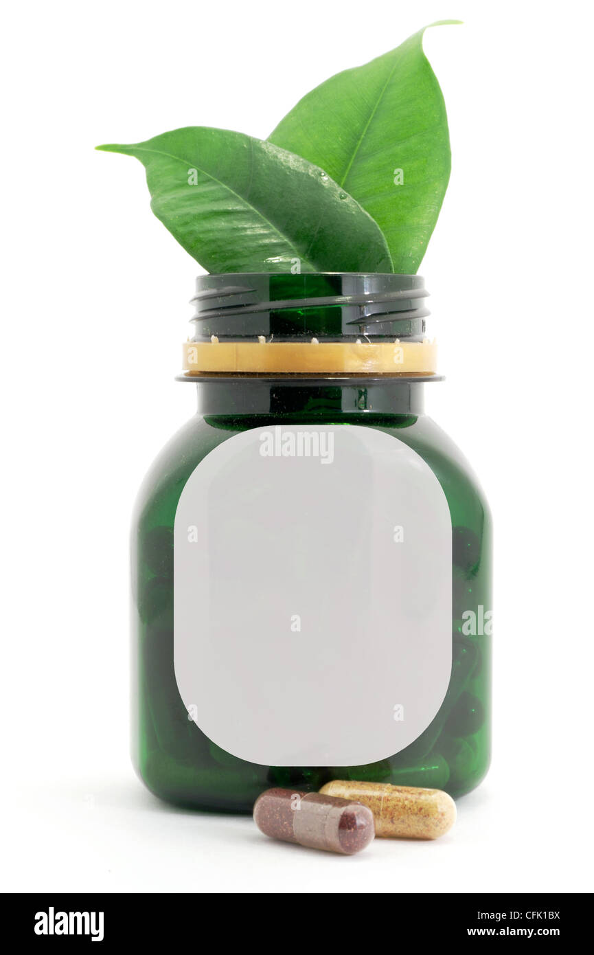 Kapseln Tabletten Bio und Flasche mit grünem Blatt Stockfoto