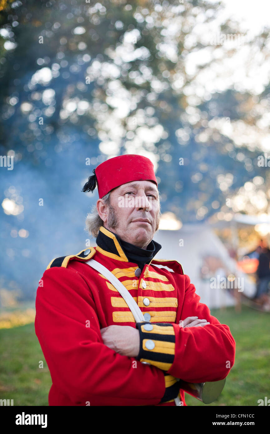 Mitglied der roten Mantel Reenactment Gruppe Ost Norfolk Miliz der georgischen Periode 1803-1815. Stockfoto