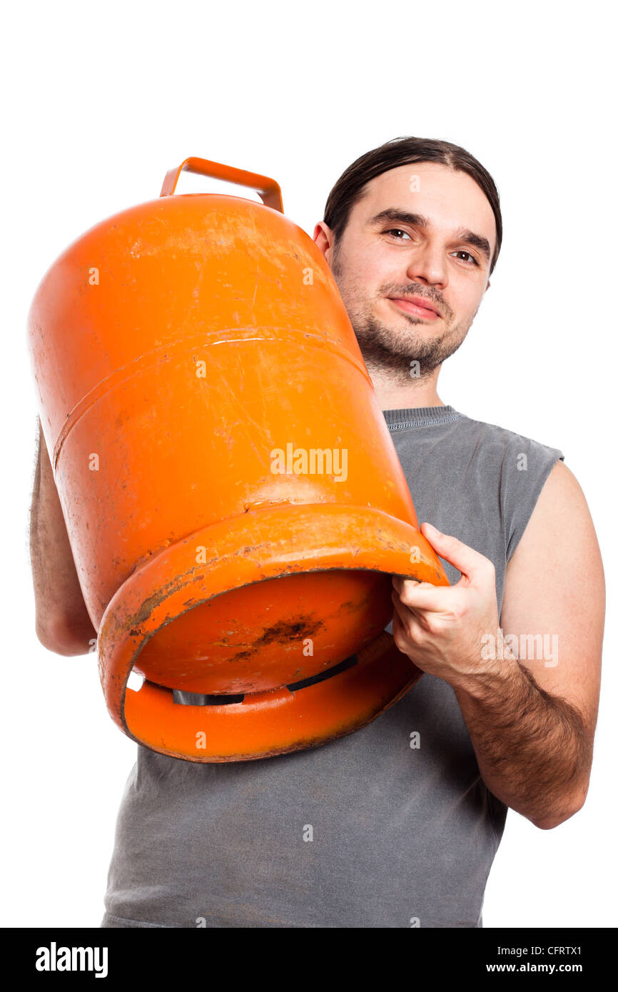 Lächelnde Jüngling mit Gasflasche, isoliert auf weißem Hintergrund. Stockfoto